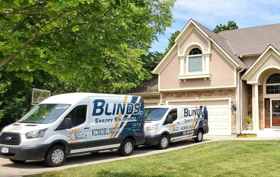 Solar Shield Blinds fleet vehicles at a job site
