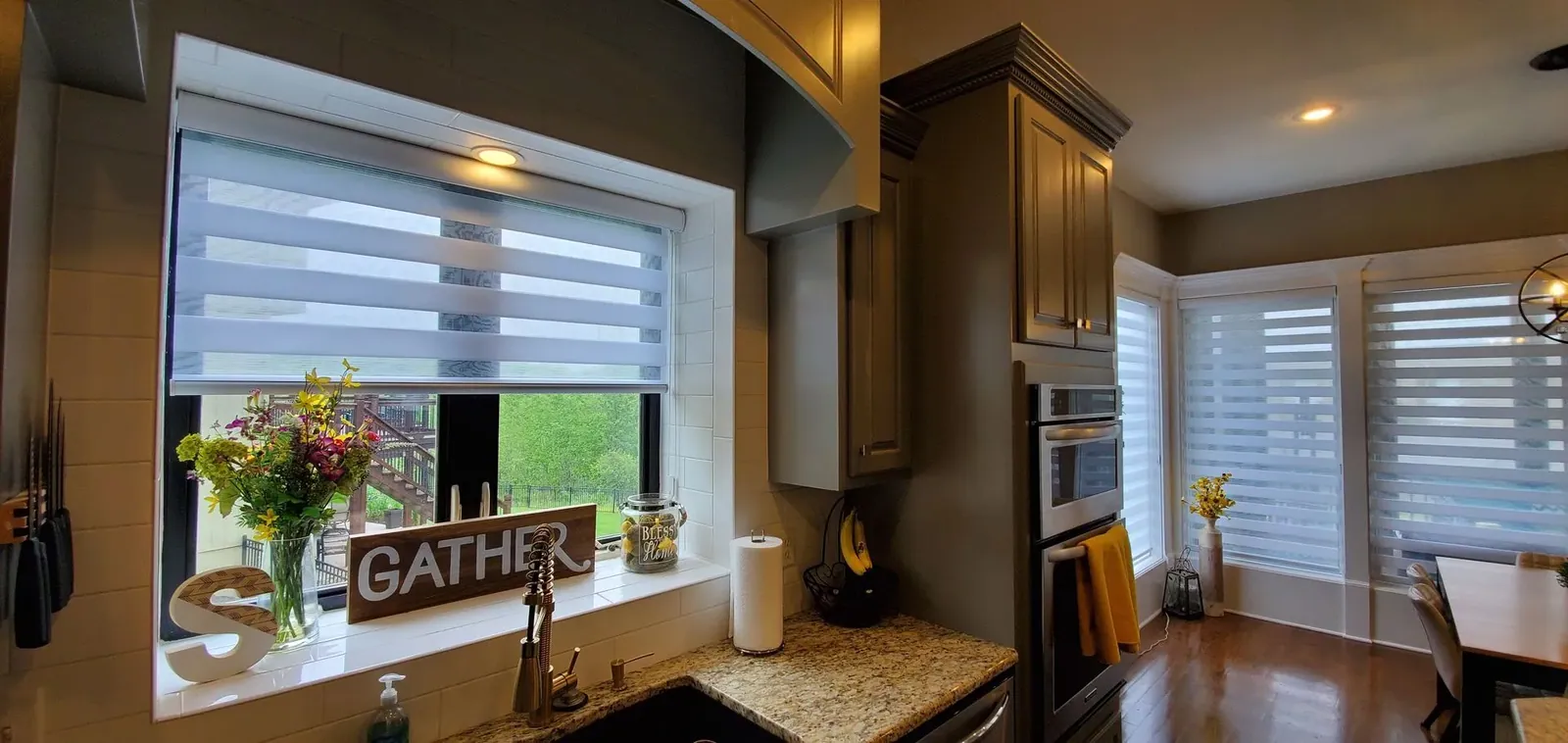 Banded Shades on a kitchen window over the sink, installed by Solar Shield Blinds