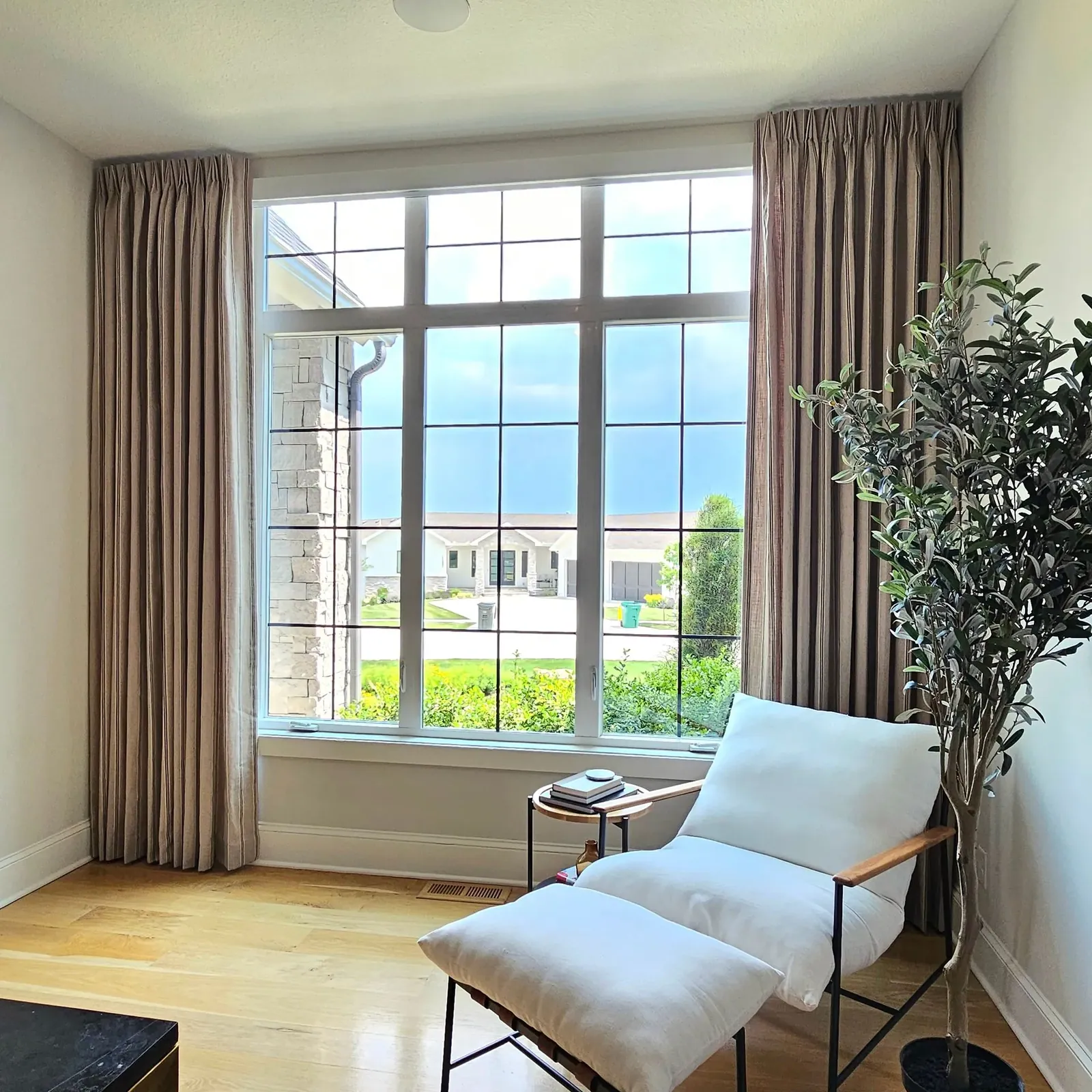 Drapery & Soft Treatments custom panels in window, a Solar Shield Blinds install