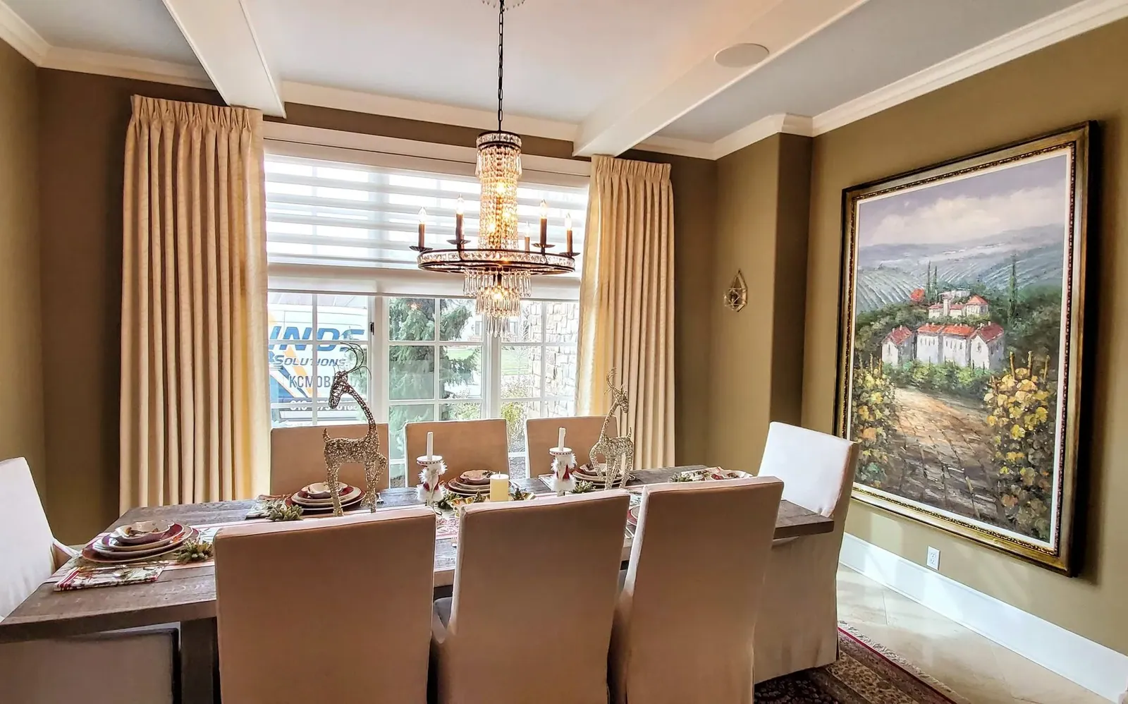 Custom drapery on a dining room window, installed by Solar Shield Blinds