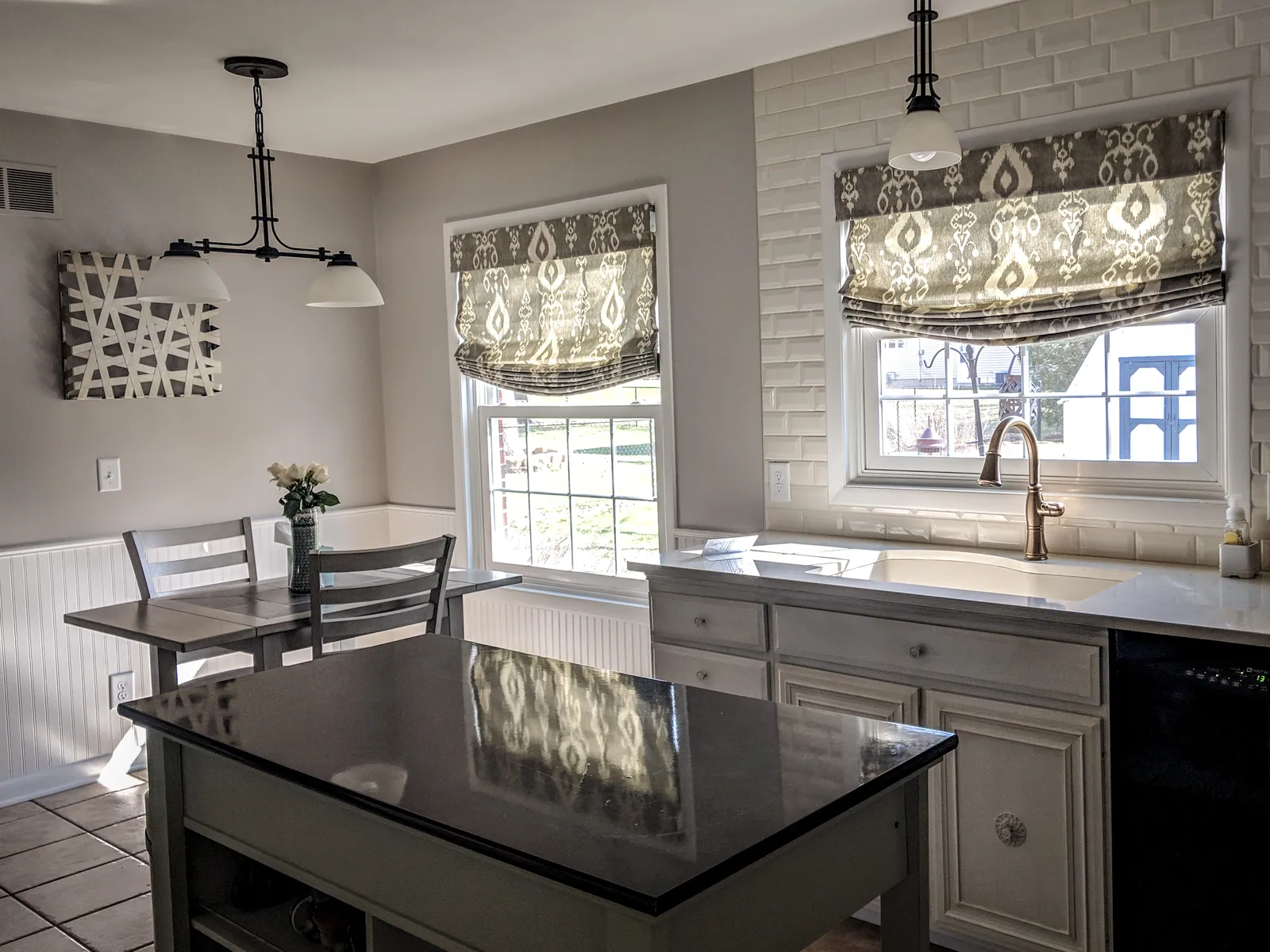 Roman shade with the shawl option, installed by Solar Shield Blinds