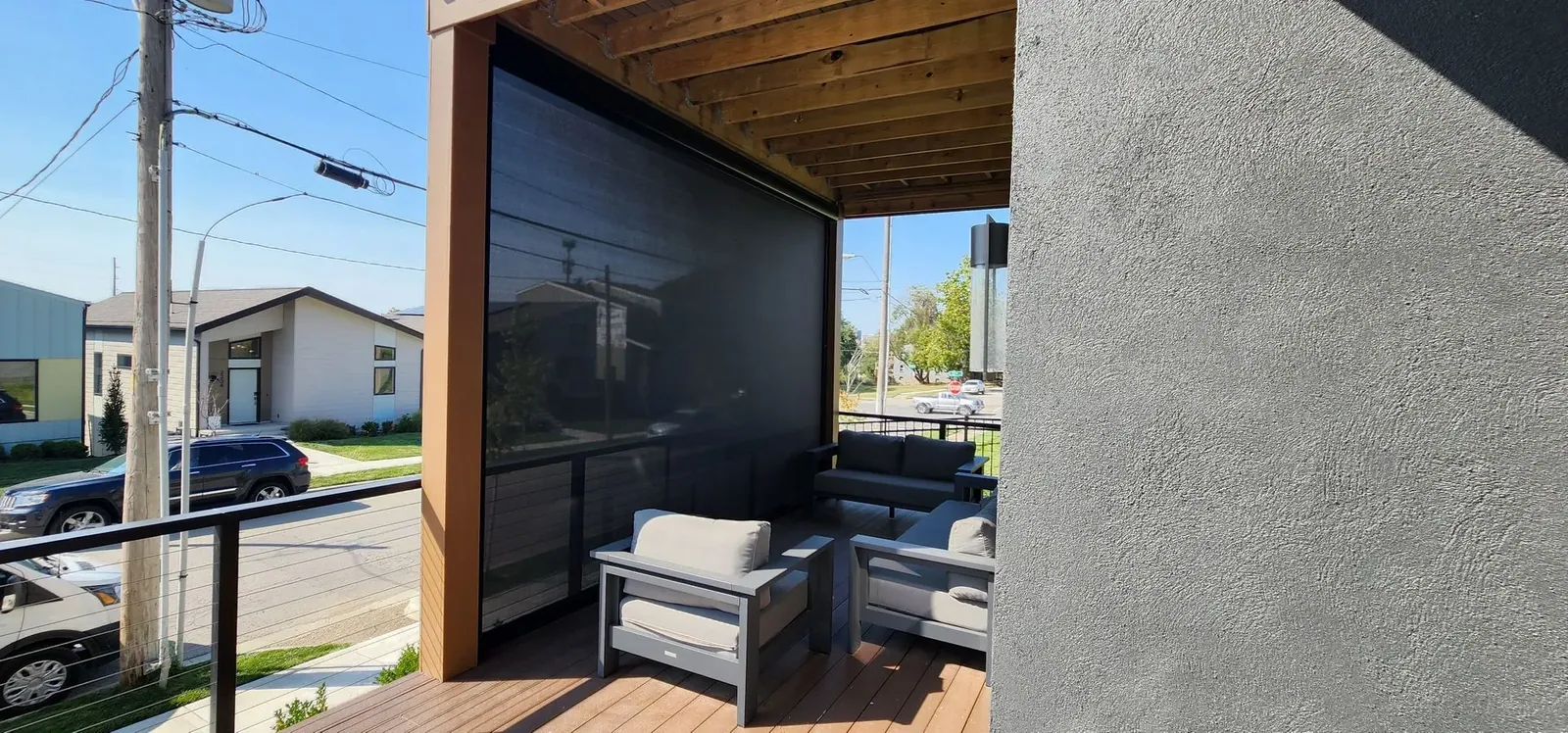 Exterior Patio Shades blocking sun partly shaded, installed by Solar Shield Blinds