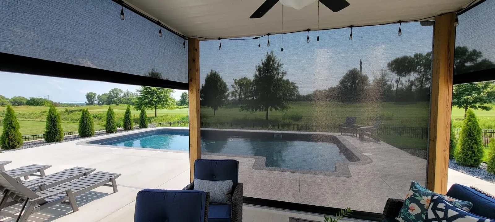 Exterior Patio Shades fully closed lower pool backyard, a Solar Shield Blinds install