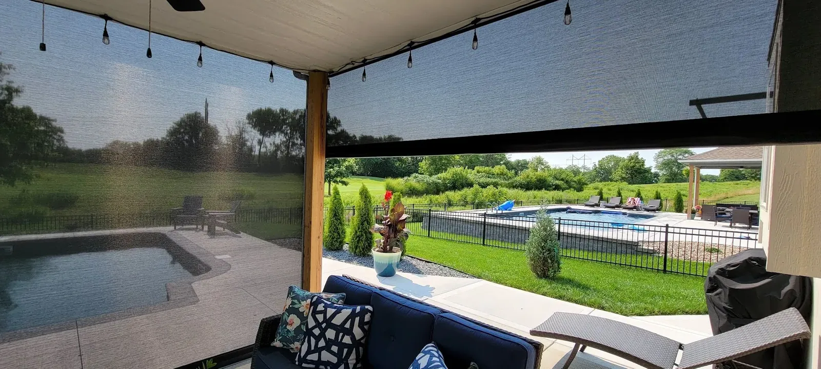 Exterior Patio Shades motorized backyard lower, measured and hung by Solar Shield Blinds