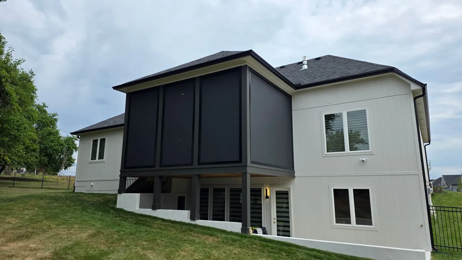 Exterior patio shades upper deck, installed by Solar Shield Blinds