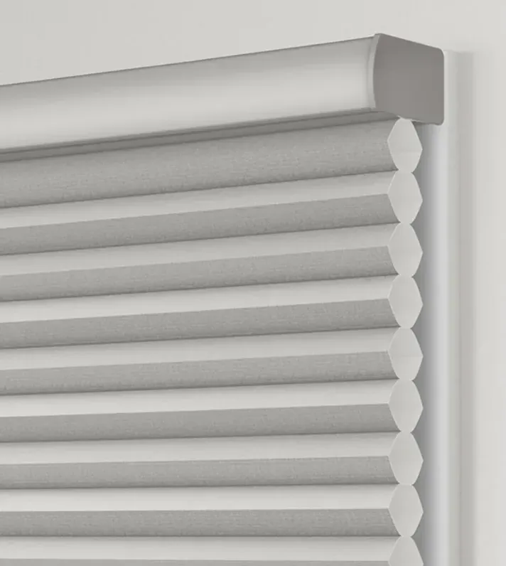 Honeycomb Shades shade design painted headrail, measured and hung by Solar Shield Blinds