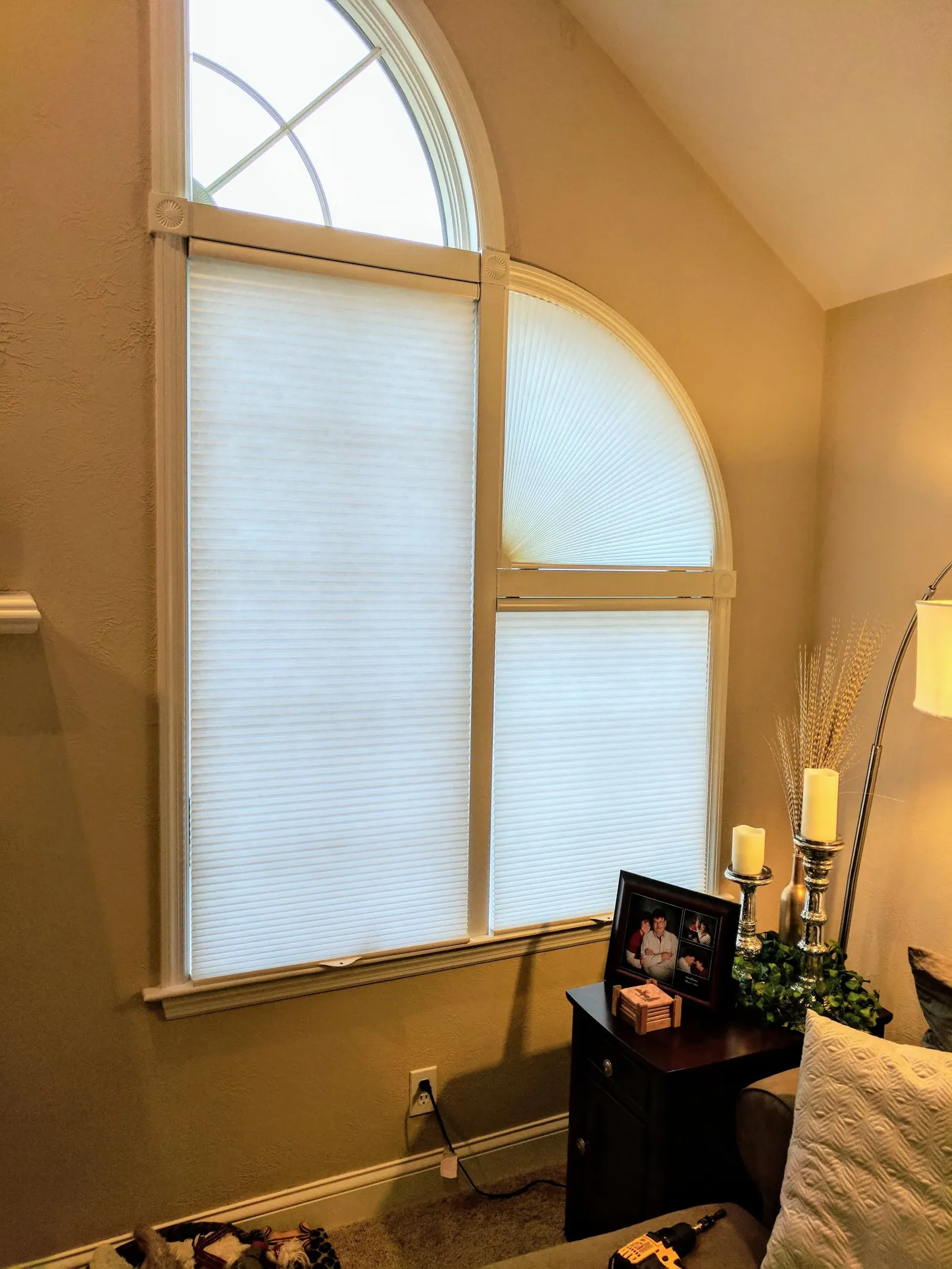 Honeycomb Shades bedroom with arch solution, measured and hung by Solar Shield Blinds