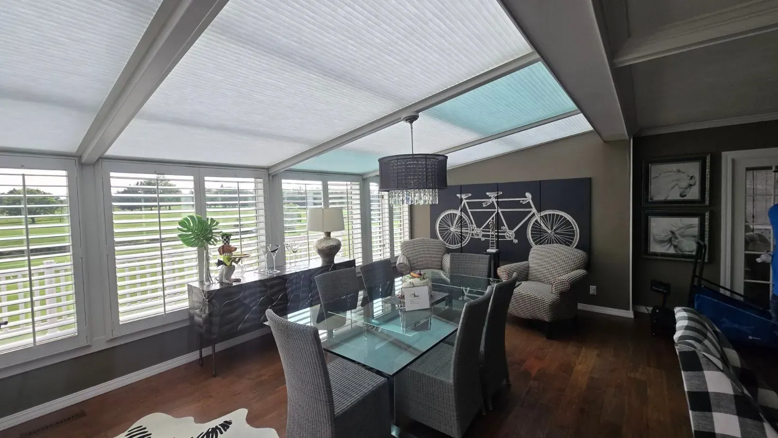 Honeycomb shades open dining room, installed by Solar Shield Blinds