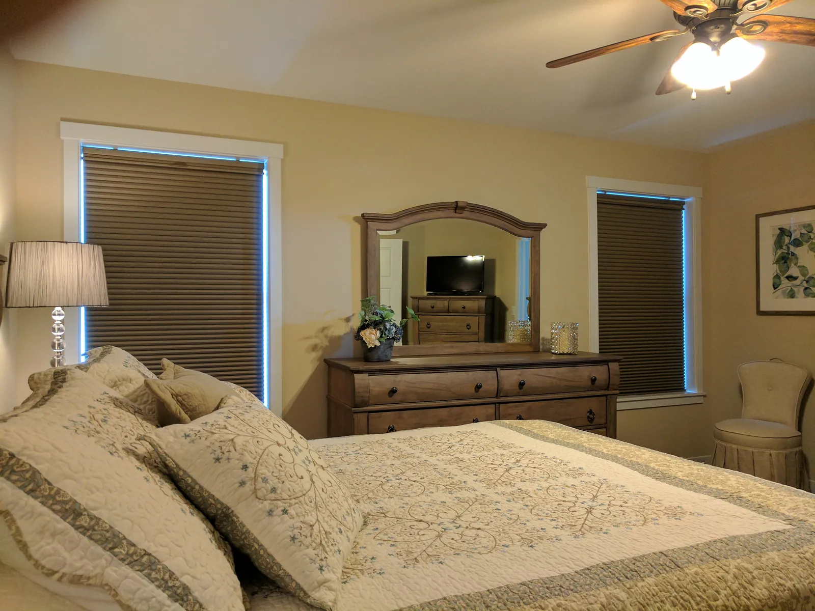 TriLight Shades with the blackout fully lowered on two bedroom windows, installed by Solar Shield Blinds