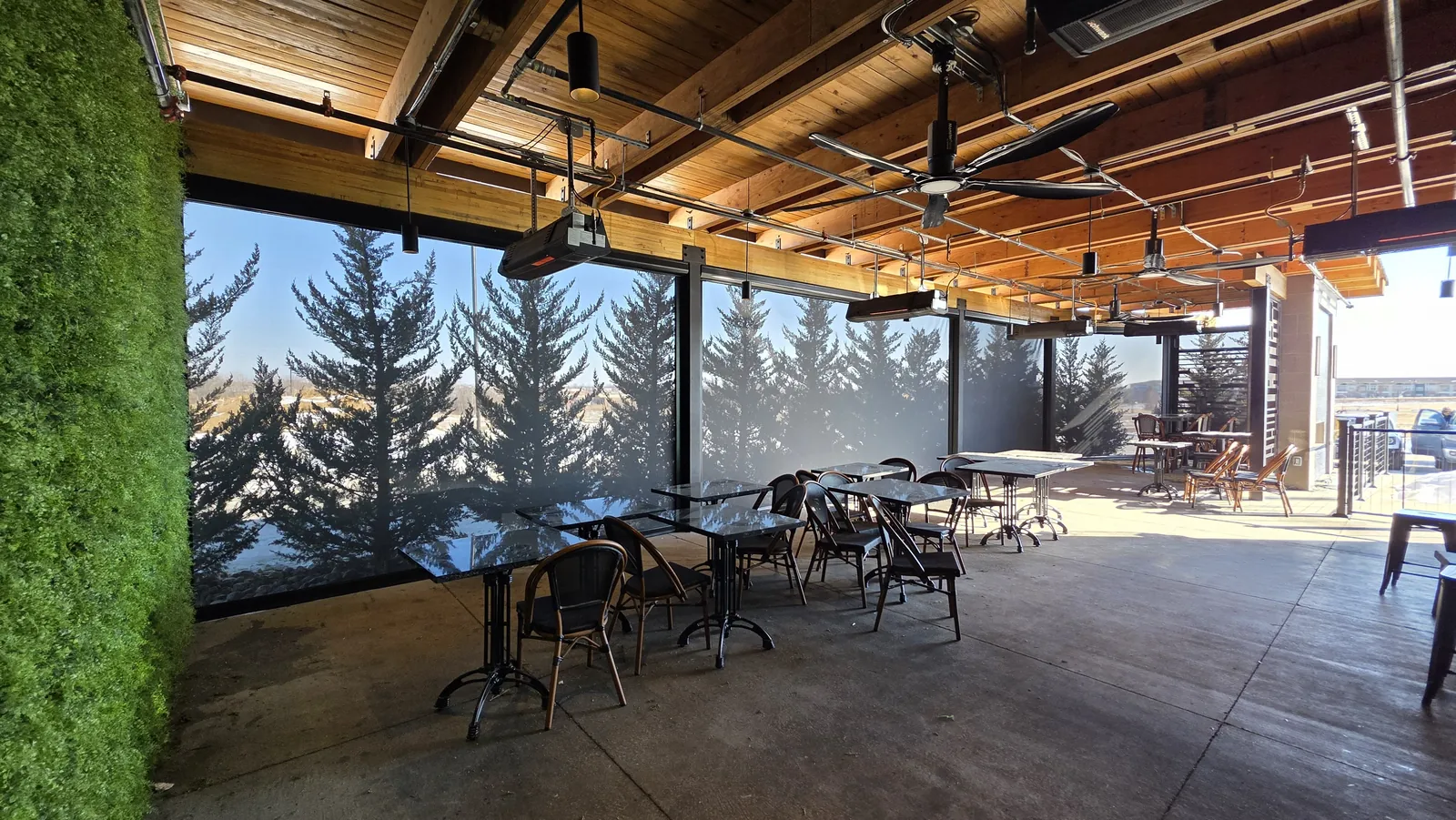 Solar screens lowered along the Meddy's patio on a bright winter day