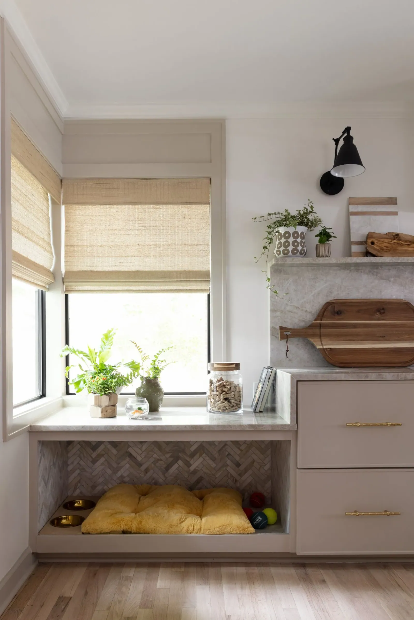 Custom natural woven shades in a kitchen, installed by Solar Shield Blinds