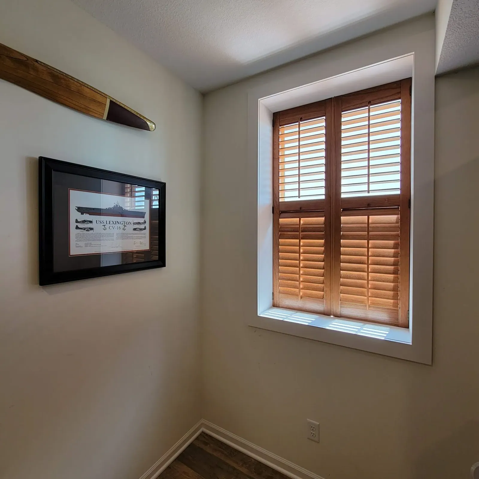 Open plantation shutters bedroom, installed by Solar Shield Blinds