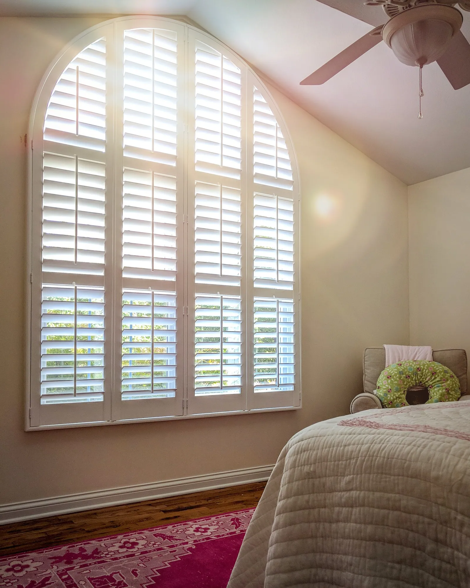 Speciality arched tall ceiling windows, installed by Solar Shield Blinds