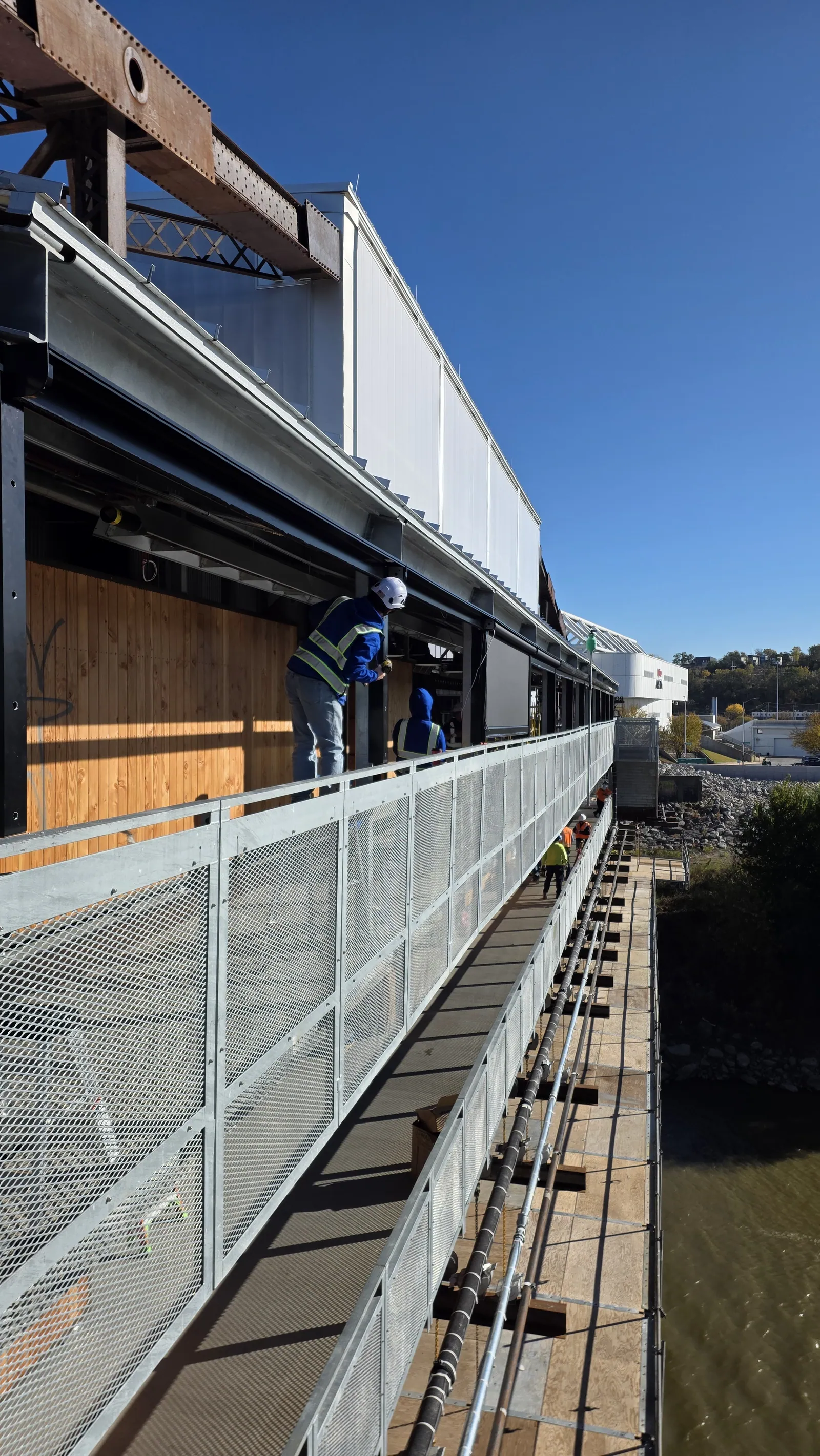 Motorized exterior screens fitted the length of the Rock Island Bridge deck above the Kansas River