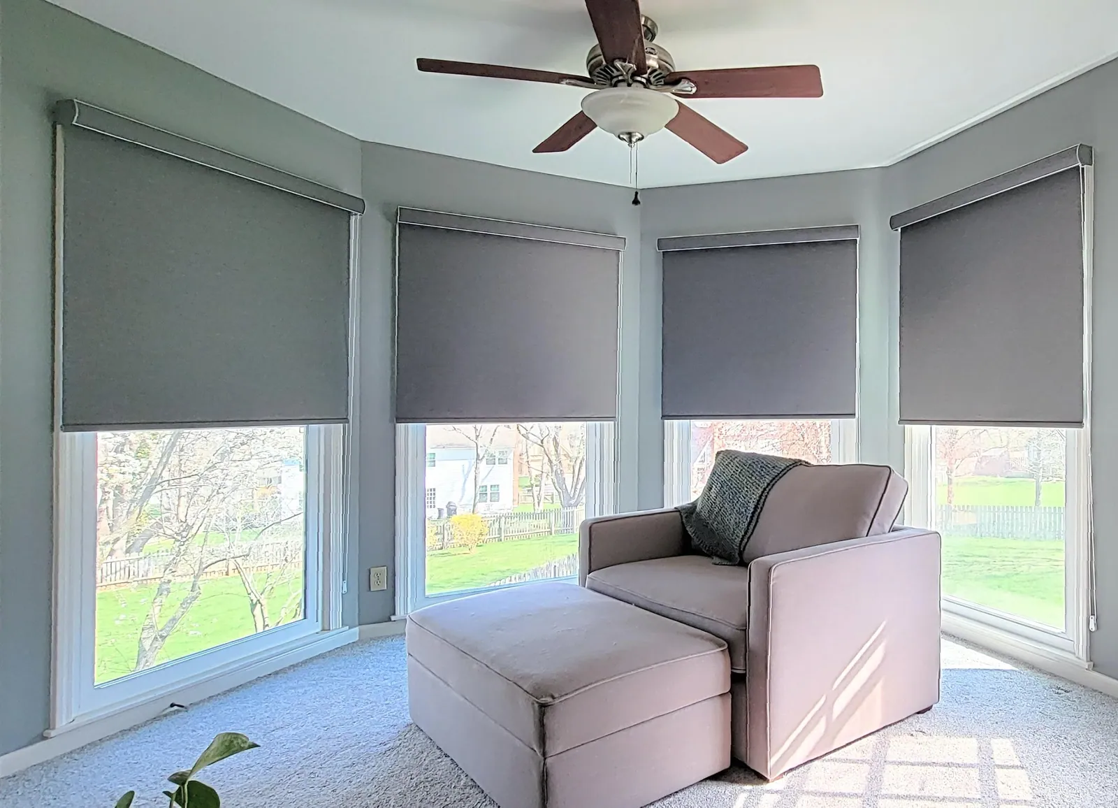 Custom roller shades bay window, installed by Solar Shield Blinds
