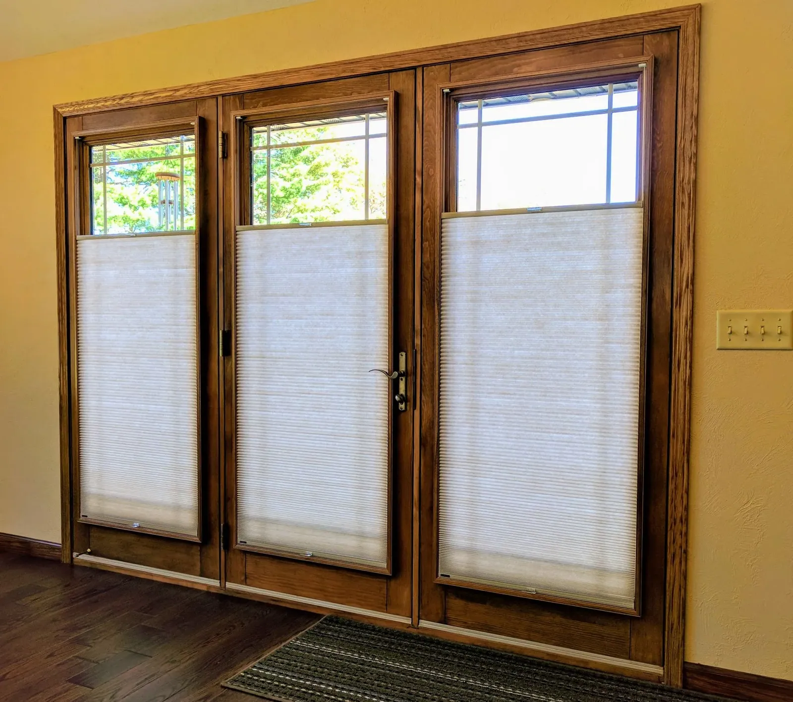 Top Down Bottom Up honeycomb shades on wood French doors