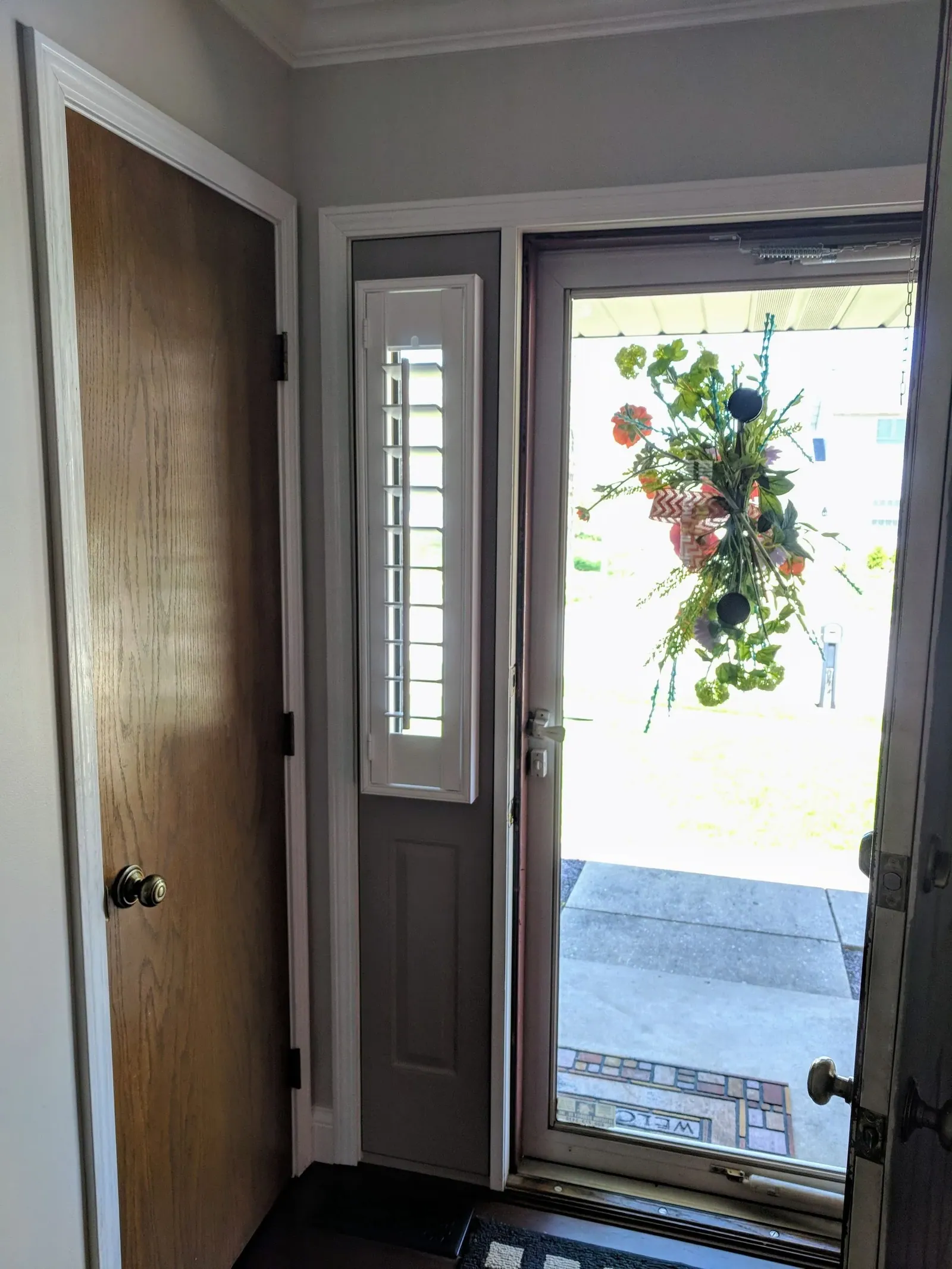 Custom fit sidelight, installed by Solar Shield Blinds