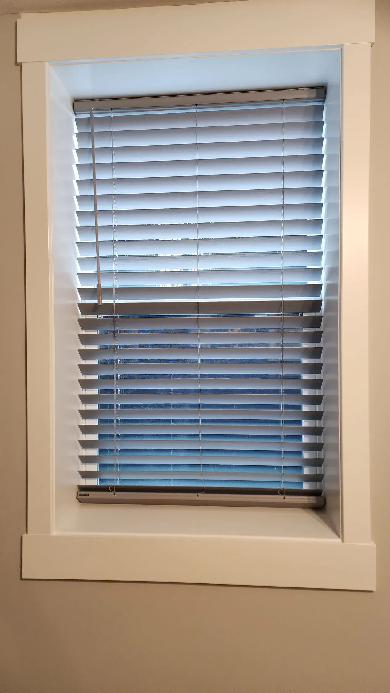 Custom wood & faux wood blinds window, installed by Solar Shield Blinds